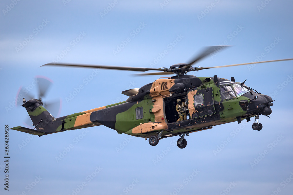 Fototapeta premium Camouflaged army helicopter.
