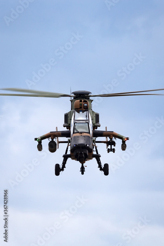 Fototapeta Naklejka Na Ścianę i Meble -  Army attack helicopter flying head on view.