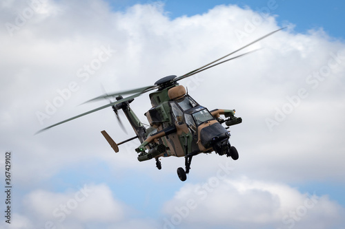 Fototapeta Naklejka Na Ścianę i Meble -  Camouflaged army attack helicopter.