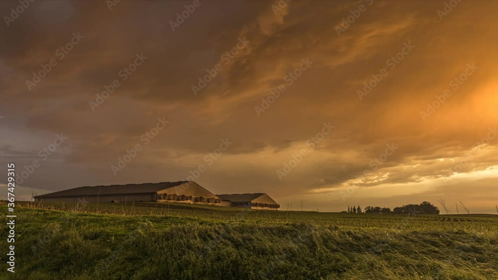 Orange storm over grain storage facilities Orange storm over grain storage facilities