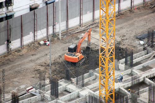 Top View the Backhoe is Working on The Construction site.