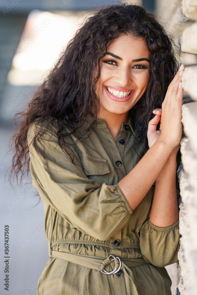 © javiindy - Happy Arab Woman with curly hair outdoors © javiindy - Happy Arab Woman with curly hair outdoors