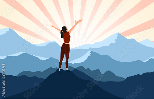 successful woman hiker enjoy  the view with arms open on cliff edge top of mountain and sunshine background.