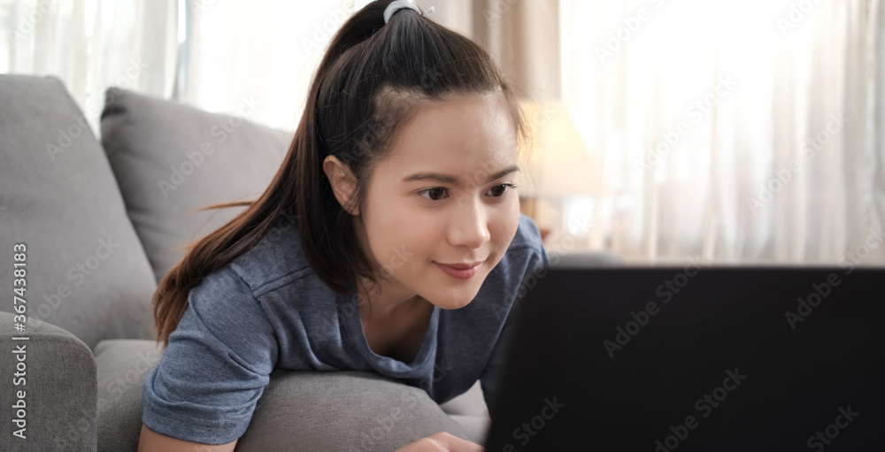 Sporty young asian woman watching fitness video tutorial online concept. Sporty young asian woman watching fitness video tutorial online concept.