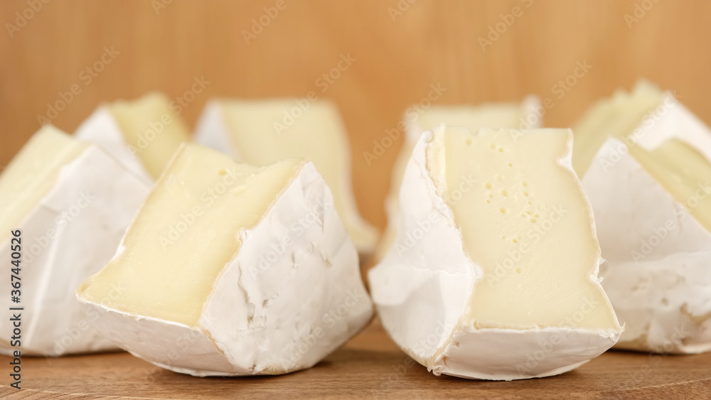 soft cheese Camembert Delicious pieces of white mold cheeses with soft textures Camembert close up
