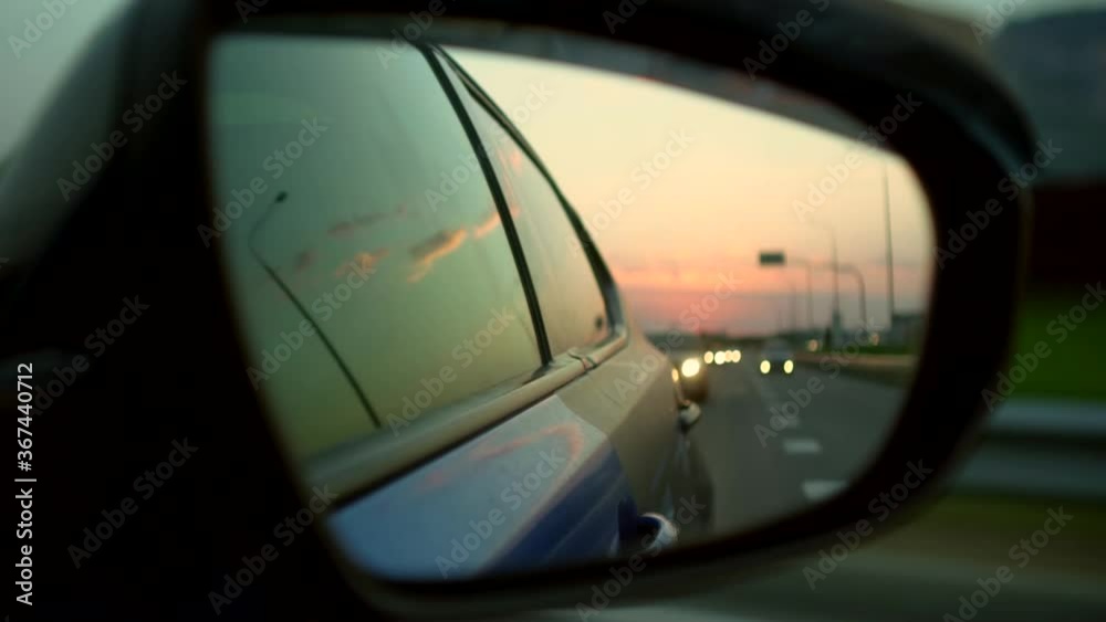 reflection of the road in the rearview mirror reflection of the road in the rearview mirror