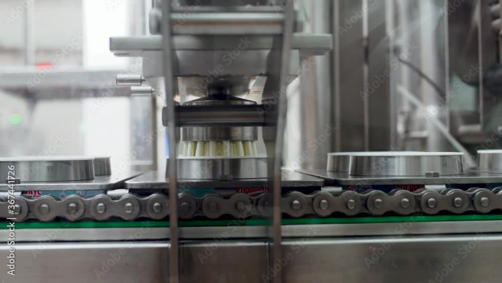 Cloce up. Dairy food production sour cream automated line Cloce up. Dairy food production sour cream automated line