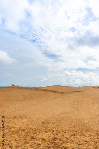 Red Sand Dunes, also known as Golden Sand Dunes, is located near Hon Rom beach, Mui Ne, Phan Thiet city. © CravenA