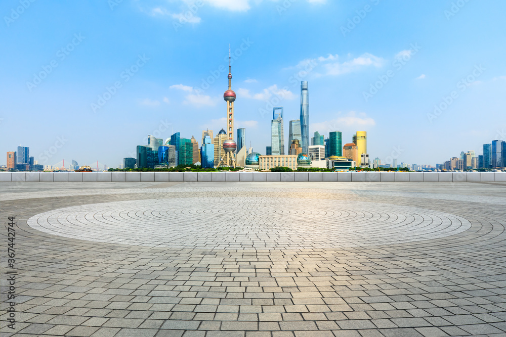 Empty square floor and city skyline and buildings in Shanghai,China.