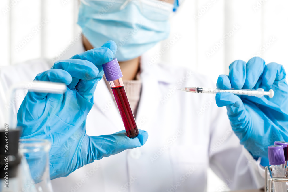 Professional doctors perform find virus tests from samples of blood tests to diagnose coronary virus infections analysis and sampling of infectious Professional doctors perform find virus tests from samples of blood tests to diagnose coronary virus infections analysis and sampling of infectious