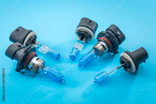 Halogen diod car bulb isolated on color background for repair. modent equipment for headlight