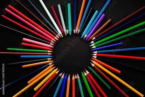 School and office supplies on blackboard background