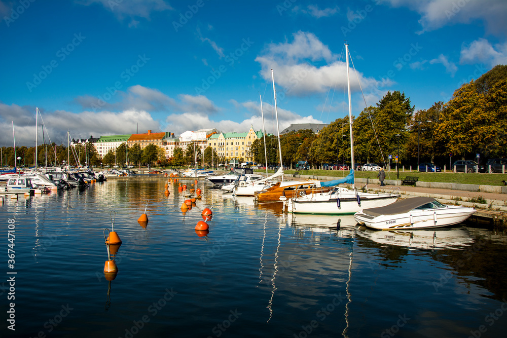 Nice finnish harbor with yachts during sunny autumn day.