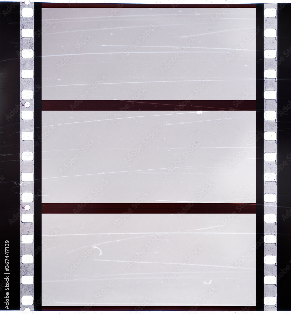real 70mm film movie cine strip with scratches and empty or blank