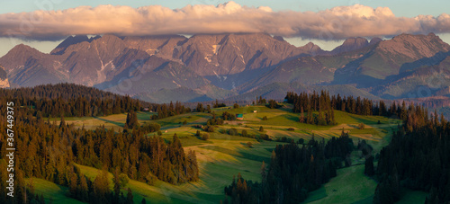Fototapeta Naklejka Na Ścianę i Meble -  Panorama of the Tatra Mountains in Poland in the beautiful light of the setting sun
