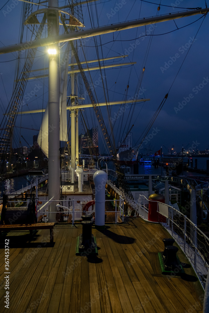Sailing boat in the dock at night