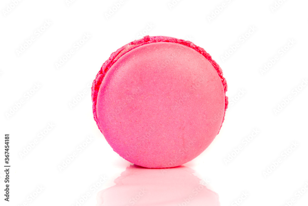 French sweet cookie. Minimal food bakery concept. Sweet almond colorful unicorn pink macaron or macaroon dessert cake isolated on white background. French sweet cookie. Minimal food bakery concept. Sweet almond colorful unicorn pink macaron or macaroon dessert cake isolated on white background.