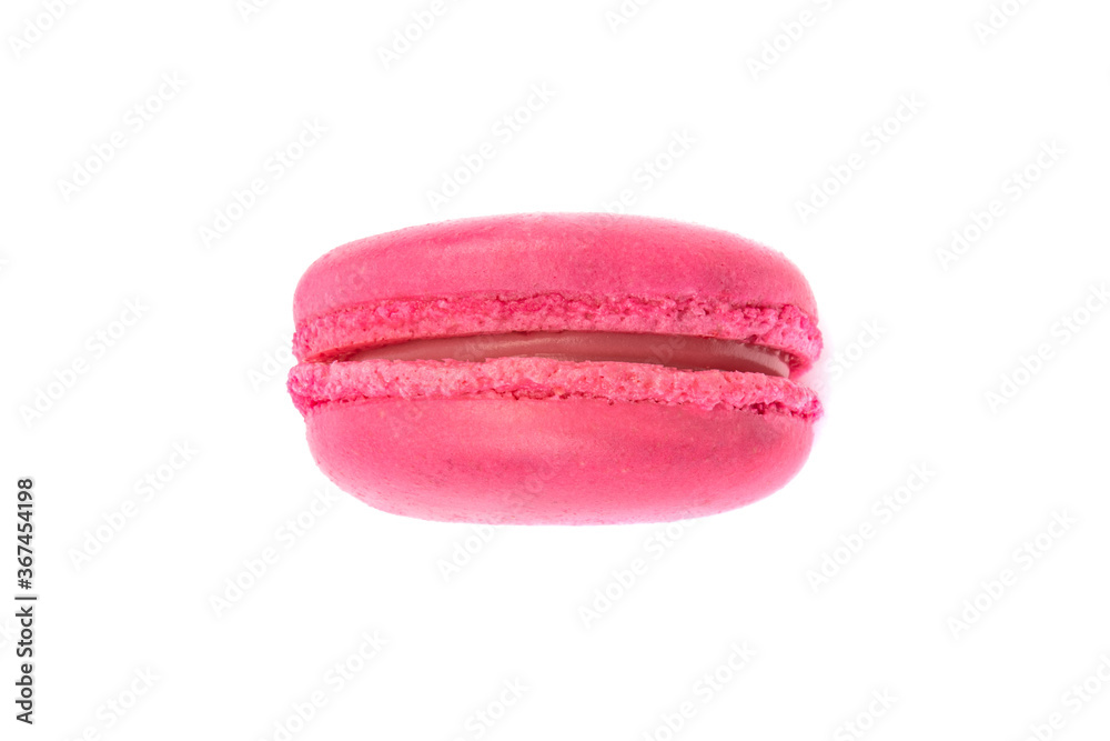 French sweet cookie. Minimal food bakery concept. Sweet almond colorful unicorn pink macaron or macaroon dessert cake isolated on white background. French sweet cookie. Minimal food bakery concept. Sweet almond colorful unicorn pink macaron or macaroon dessert cake isolated on white background.