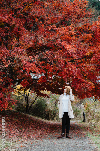 Young asian woman travel in Japan in Autumn season,Travel concept