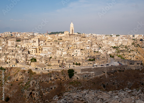 Panoramic view of Sassi di Matera a historic district in the city of Matera, well-known for their ancient cave dwellings from the Belvedere di Murgia Timone, Basilicata, Italy