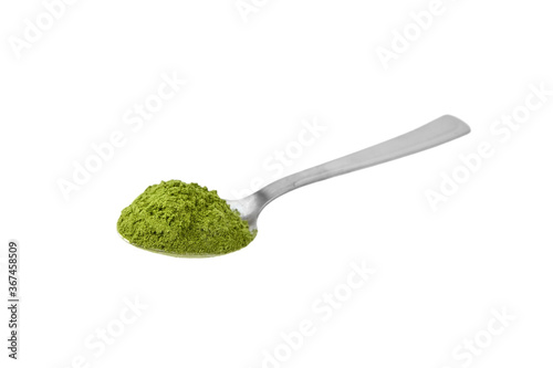Quadro su tela Green freeze dried wheatgrass powder in steel teaspoon isolated on white