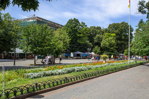 green sunny summer view of central city Deribasovskaya  street  Odessa Ukraine
