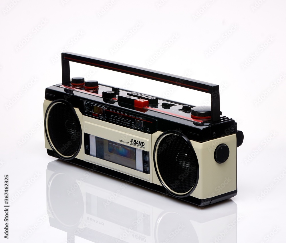 Vintage boom box on white background with reflection