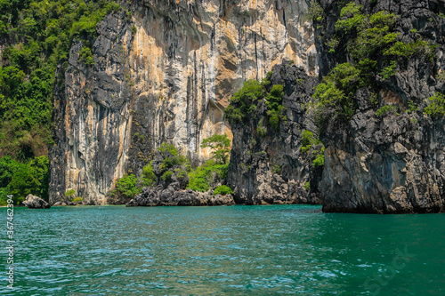 Eroded overgrown limestone rocks in Phang Nga Bay, Ao Phang Nga Marine National Park, Thailand,