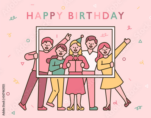 Friends are holding a photo frame and taking a birthday picture together. flat design style minimal vector illustration.