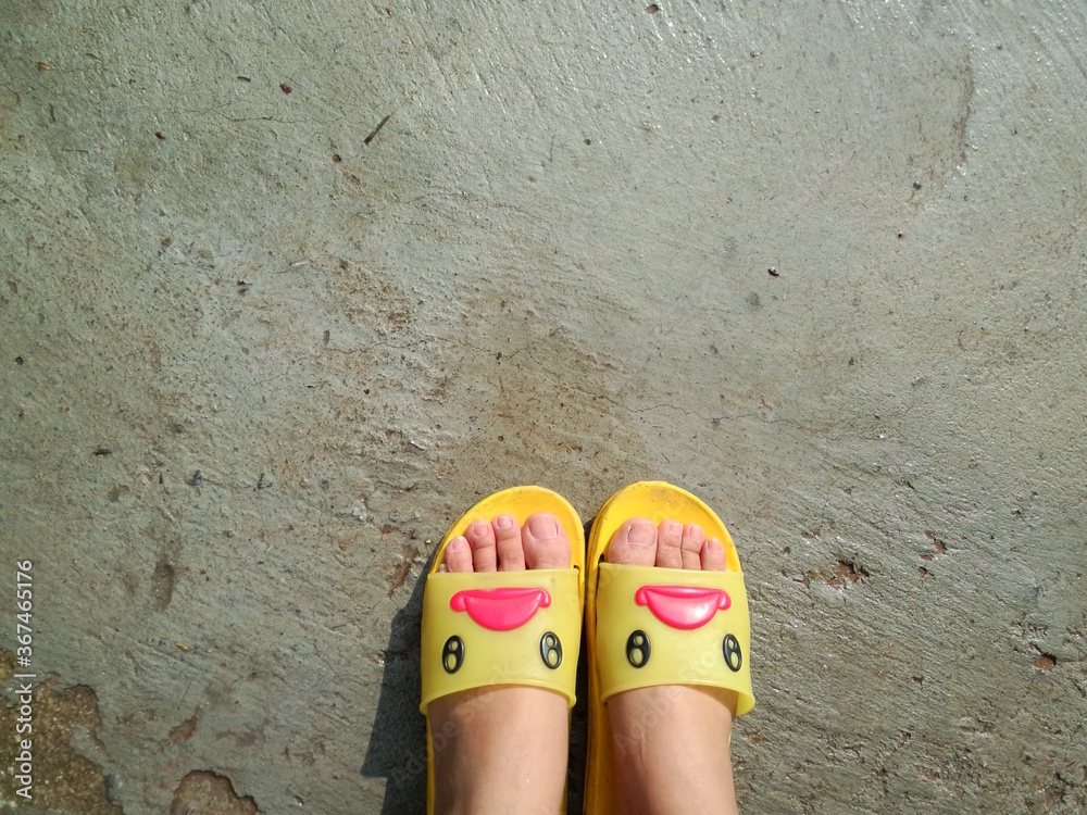 Fototapeta premium flip flops on the beach