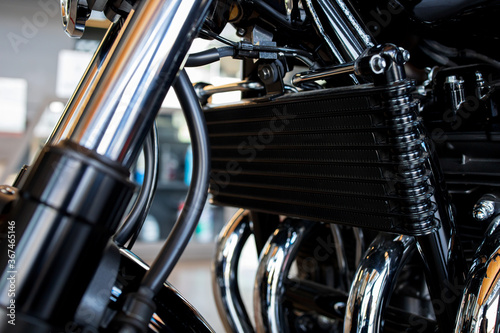 closeup radiators of bigbike motorcycles with soft-focus and over light in the background