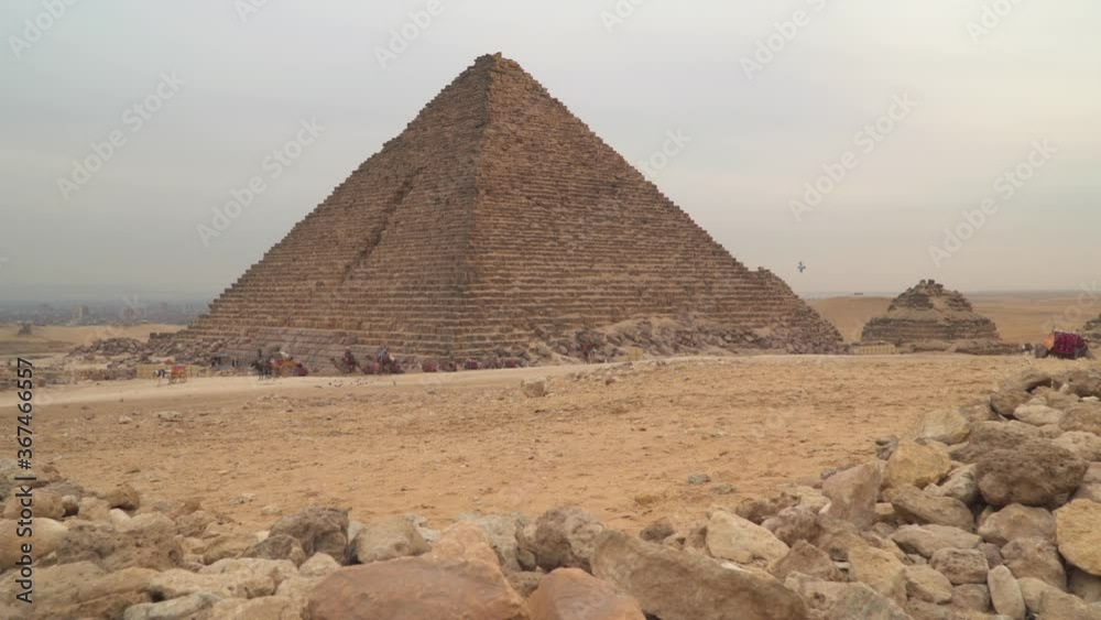 Egypt. Pyramid of Menkaure in Giza. Camels at the foot of the pyramids Egypt. Pyramid of Menkaure in Giza. Camels at the foot of the pyramids
