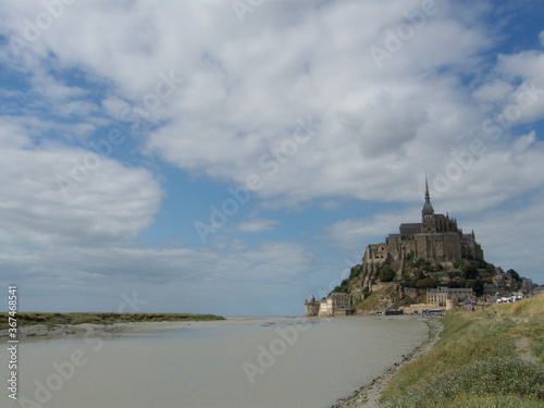 Mont Saint-Michel, France, it's an island in Normandy with a sanctuary in the middle built in honor of Saint-Michel