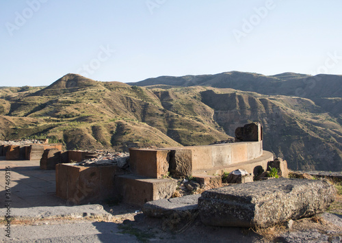  Ruined pagan greek old temple among the mountains in Garni