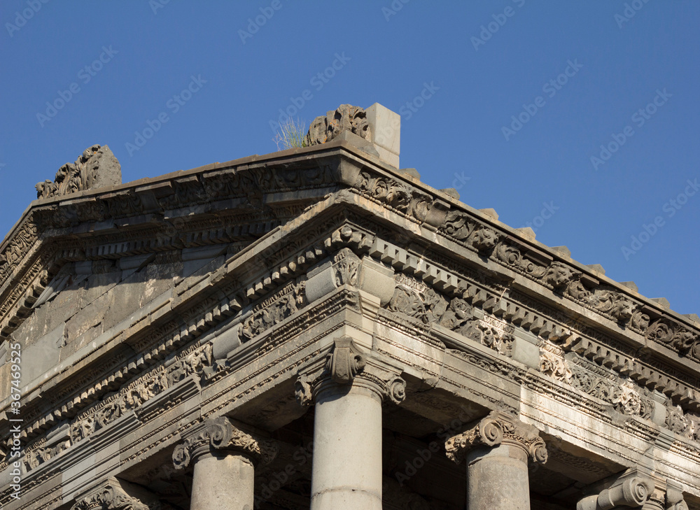 Fototapeta premium Ancient Greek stone roof and columns with ornaments