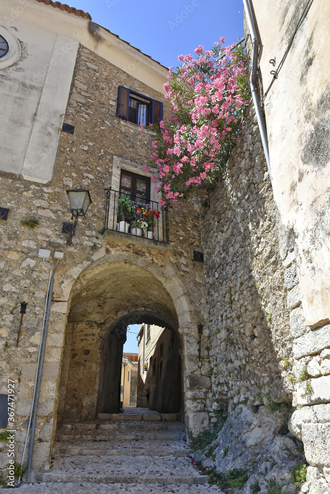 A narrow street in the old buildings of San Donato Val di Comino, a medieval village in the Lazio region.