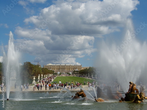 Versailles, France, the palace of Versailles with a beautiful garden in front of facade with a lot of fountains and statues