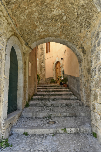 A narrow street in the old buildings of San Donato Val di Comino, a medieval village in the Lazio region. © Giambattista