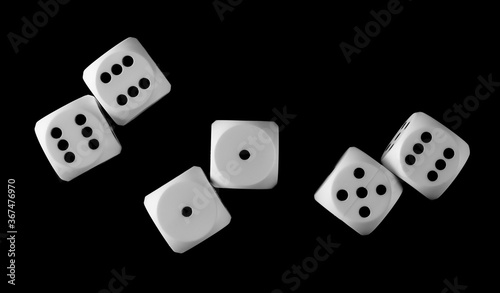 White gambling die  dice for tabletop games and poker isolated on black background  top view