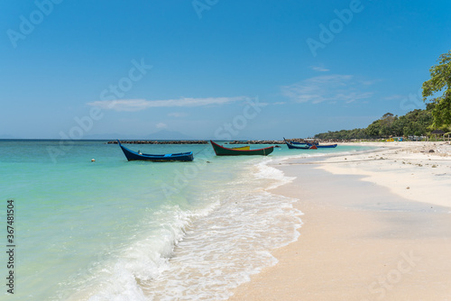 Fototapeta Naklejka Na Ścianę i Meble -  The village Pasir Putih with its dreamlike white sandy beach in the south of the Weh island, Sabang, the northernmost point of Indonesia