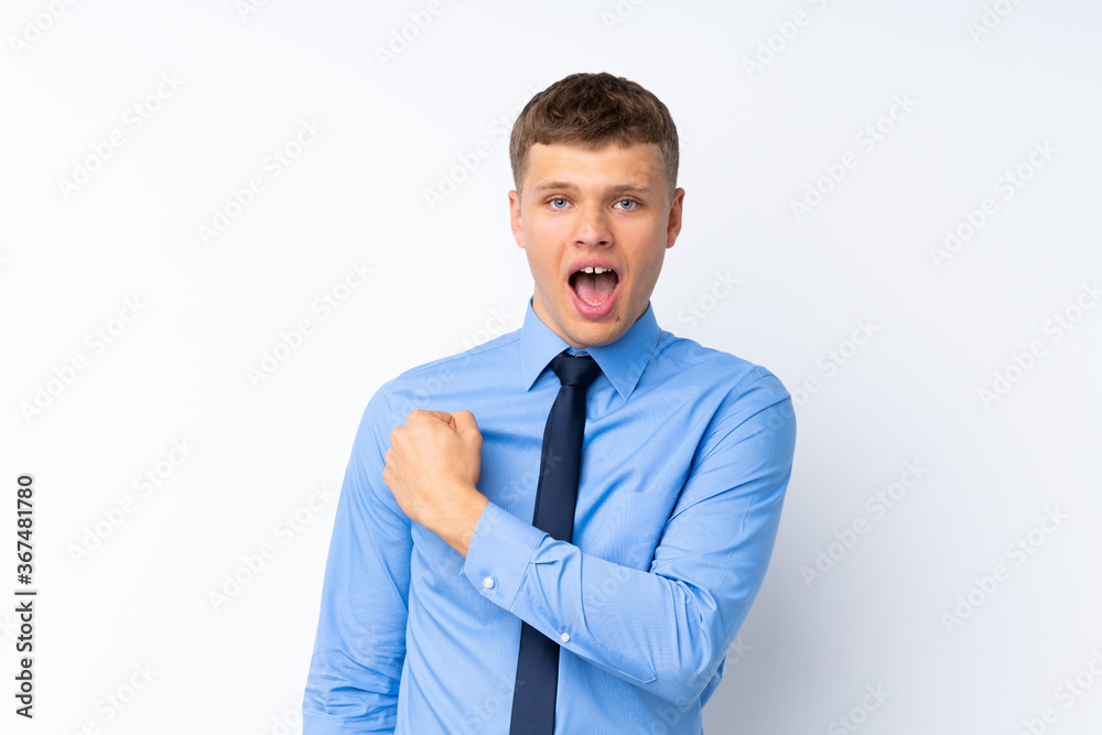 Young handsome businessman celebrating a victory Young handsome businessman celebrating a victory