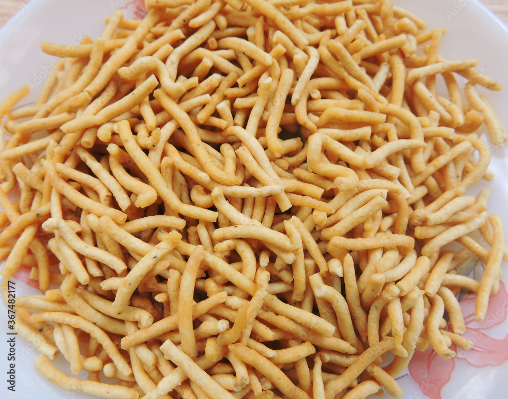 A popular crispy snack prepared by using moth beans, besan and spices. It is called Bhujia in local language in India. It originated from Bikaner, India. A popular crispy snack prepared by using moth beans, besan and spices. It is called Bhujia in local language in India. It originated from Bikaner, India.