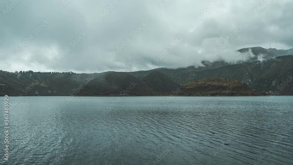 Timelapse of Laguna Cuicocha, near Otavalo Ecuador, during foggy morning Timelapse of Laguna Cuicocha, near Otavalo Ecuador, during foggy morning