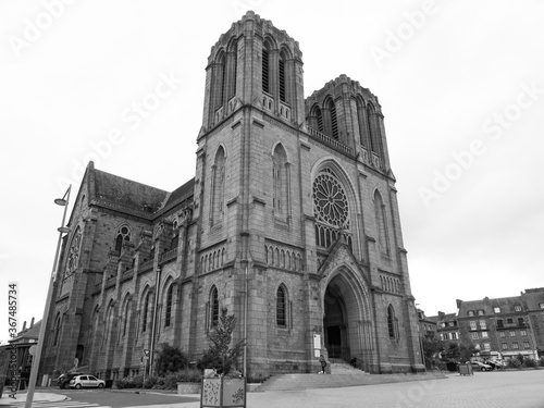 Saint-Germain Church. Beautiful neogothic style religious monument inspired by the famous Catholic Cathedral Notre-Dame-de-Paris. Shot in black and white. Flers, Normandy, France.