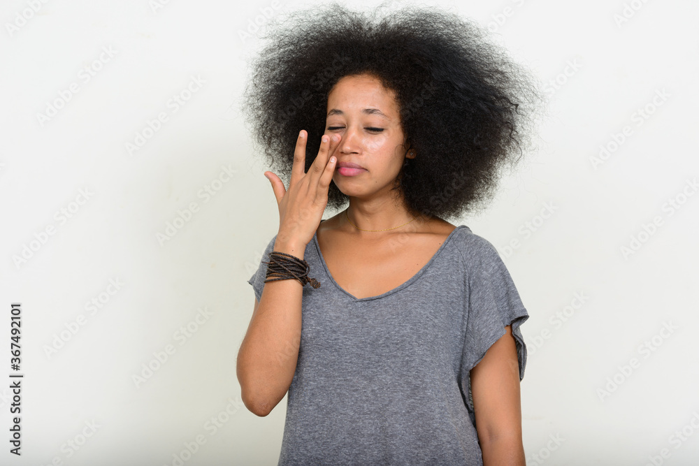 Portrait of young beautiful African woman with Afro hair Portrait of young beautiful African woman with Afro hair