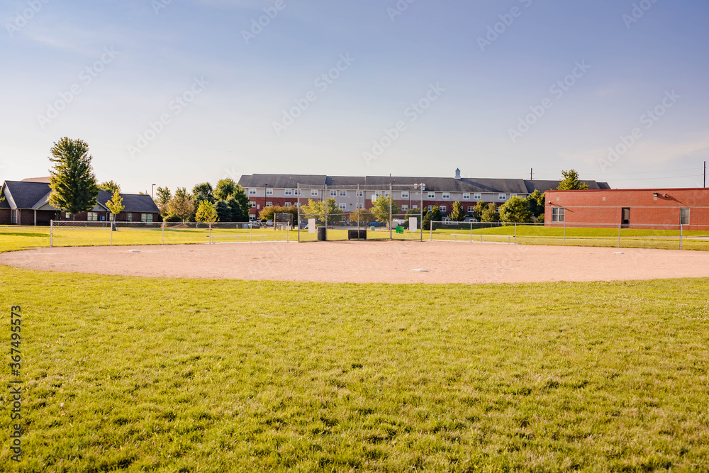 a wide angle view of a baseball diamond #1 in a city park a wide angle view of a baseball diamond #1 in a city park