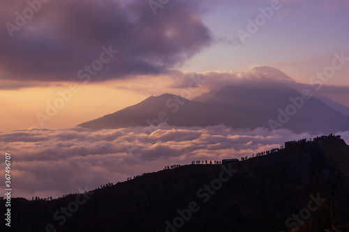 Scenic view of clouds and mist at sunrise