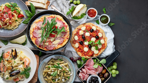 Italian food on dark background