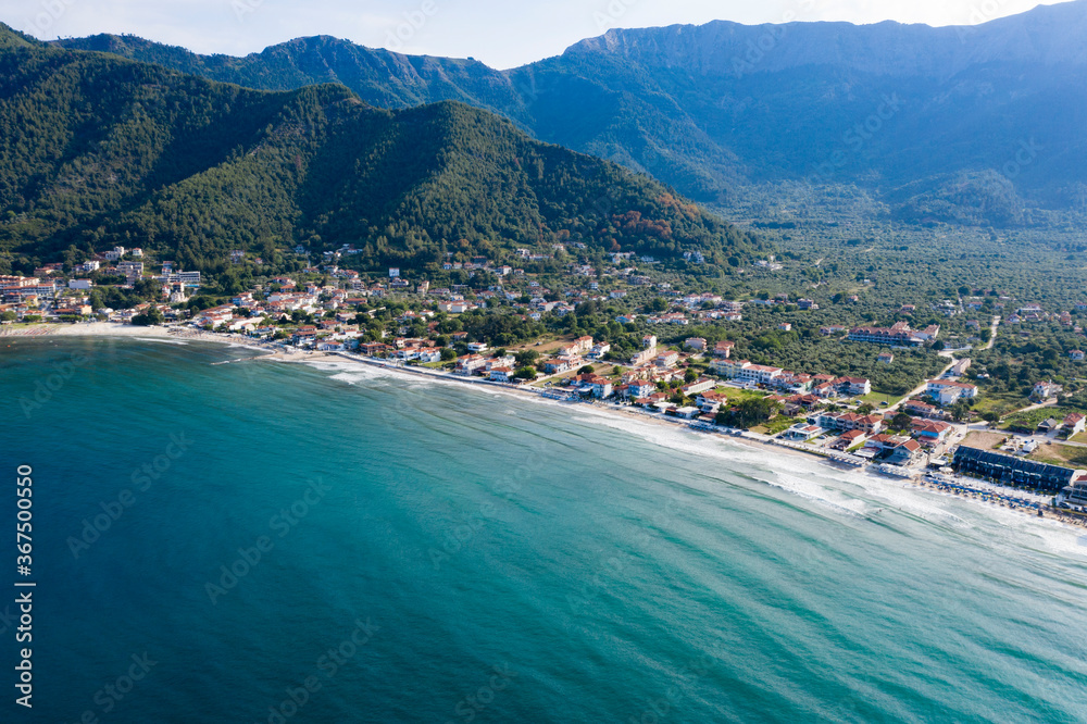  Aerial view of idyllic Golden beach toward the headland at Skala Potamia, Thassos, Greece