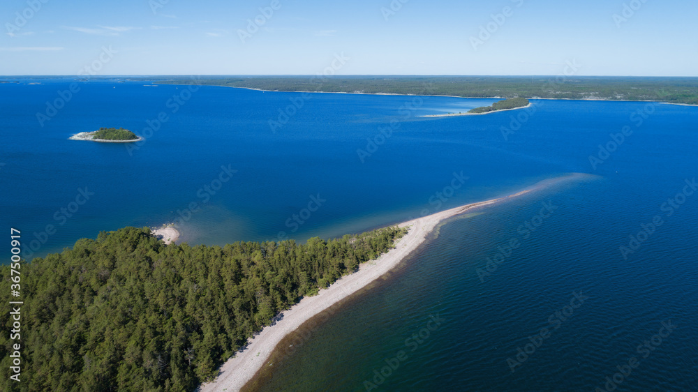Coastal nature. Scenic view on the beach at beautiful baltic sea.  Sunny summer day. Saaristomeri.	Nature of Finland.
